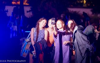 Visitors at the lido at night.