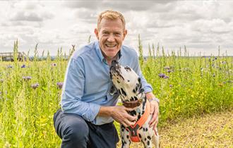 Adam Henson and a dalmatian