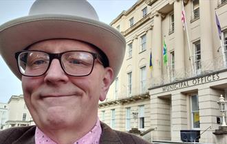 Alan Jones in front of Cheltenham Municipal Offices