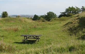 Picnic bench on a hill