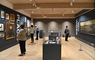 Patrons enjoying the Wilson Art Gallery displays