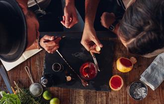 Barman making cocktails