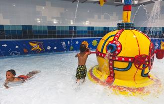 Children playing at the Splash Pad