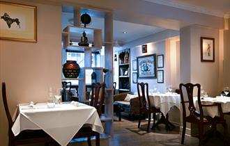 Interior tables and chairs at East India Cafe