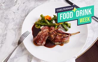 Lamb chops with jus on a white plate