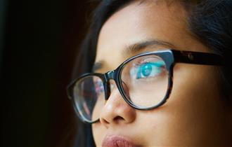 Women wearing a pair of glasses