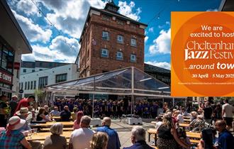 Crowds of people enjoying live music at The Brewery Quarter