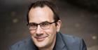 A headshot of pianist Christopher Glynn