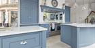 Tom Howley Cheltenham Showroom, Blue Hartford Kitchen. Luxury Bespoke Kitchens