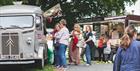 People enjoying food at festival