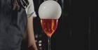 A cocktail with dry ice