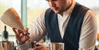 Bartender making cocktails