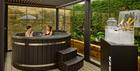 Guests relaxing in a hot tub