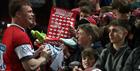 Gloucester Rugby team with fans