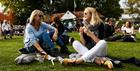 Two visitors enjoying the Cheltenham Literature Festival