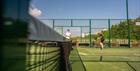 Padel players on court