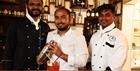 Staff behind the bar at East India Cafe