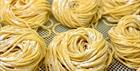 Piles of uncooked spaghetti
