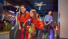 Family enjoying bowling