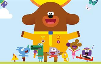 A cartoon of Hey Duggee and his animal friends