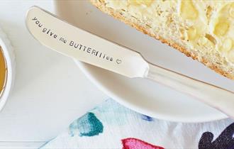 Engraved silver butter knife