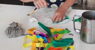 A young child making crafts