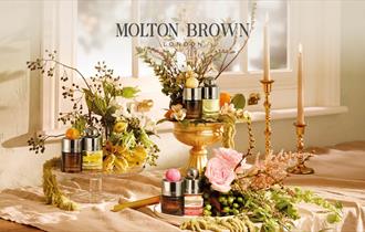 Molton Brown products and flowers