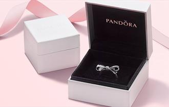 Pandora charm in its box