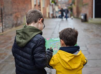 Children using a map