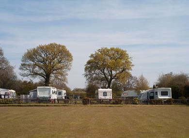 Campsite over bowling green at The Cotton Arms Touring and Camping Site