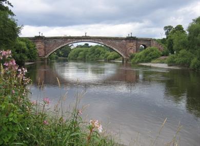 A view of Grosvenor Bridge from the Handbridge River Bank. Photo credit: John S. Turner