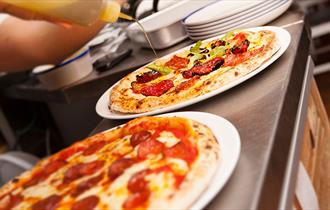 Delicious Pizza with the freshest ingredients at Urbano32.