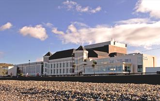 View of Venue Cymru from the Beach