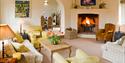 Lounge area in one of the Combermere Abbey Cottages