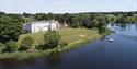 Aerial shot of Combermere Abbey with the mere