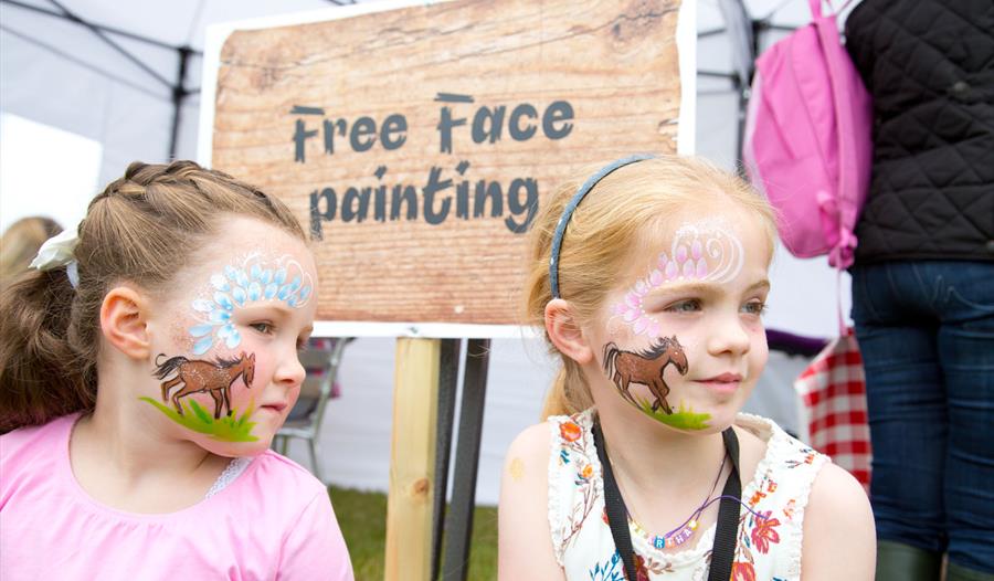 Children with painted faces