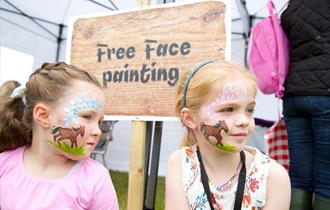 Children with painted faces