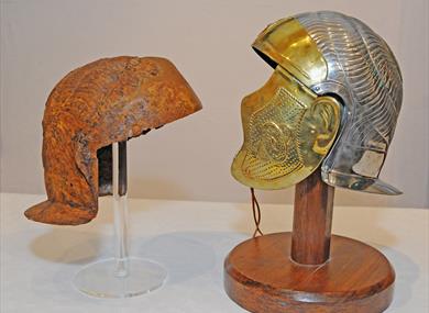 Original and replica of the Roman Auxiliary Cavalry Helmet discovered in Northwich and on display at Weaver Hall 