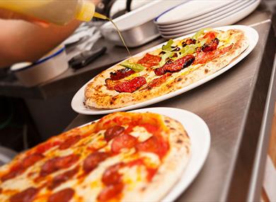 Delicious Pizza with the freshest ingredients at Urbano32. 