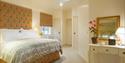 One of the master bedrooms at Combermere Abbey Cottages