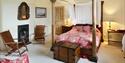 Four poster bedroom at Combermere Abbey Cottages