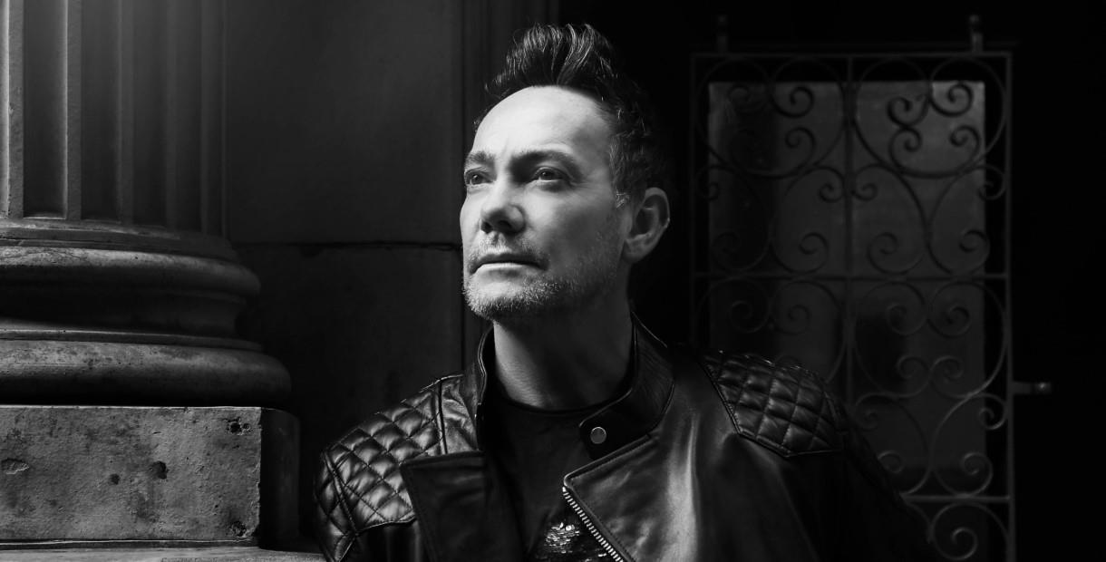 Black and white portrait of Craig Revel Horwood