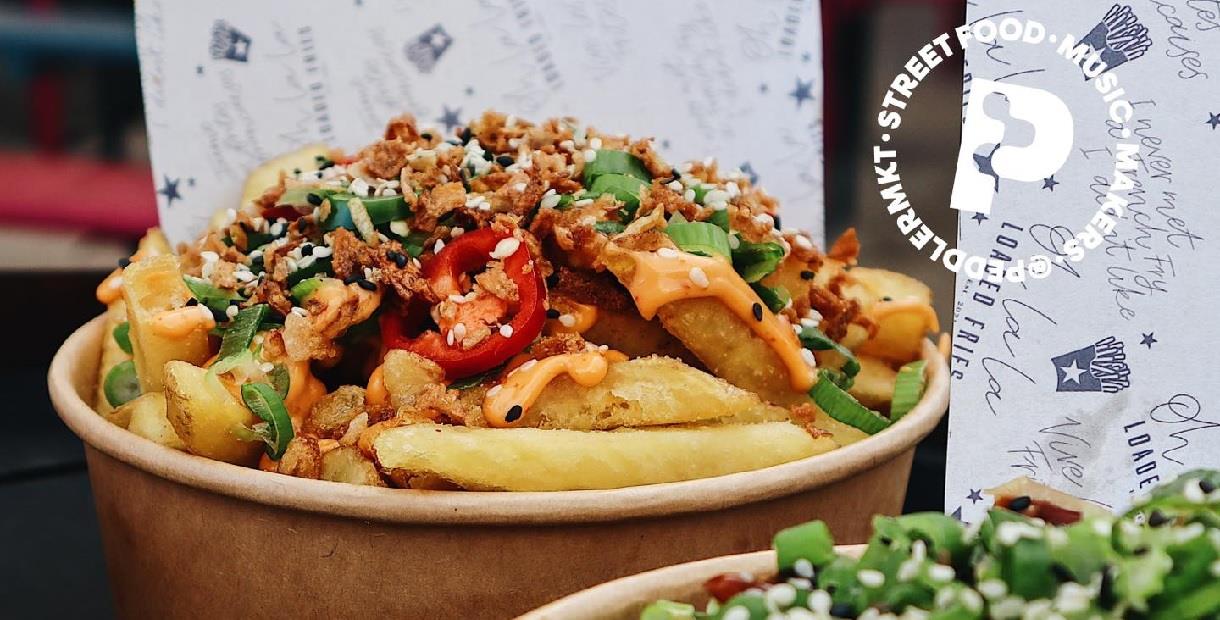 Street food - bowl of chips with various toppings