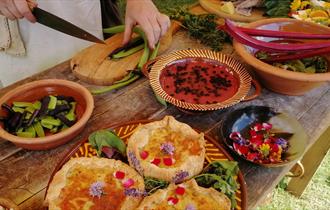 Tudor food displayed on a table