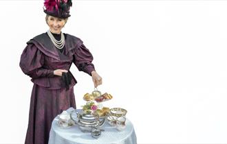 Baroness Bolsover serving afternoon tea