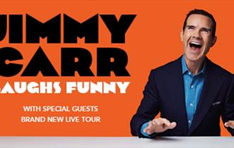 Jimmy Carr against an orange background