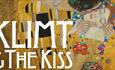 'The Kiss' by Gustav Klimt - an Art Nouveau oil painting of a man kissing a woman's cheek