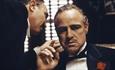 Marlon Brando and Al Pacino as Vito and Michael Corleone