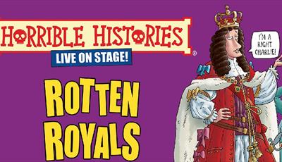 Pink back ground with Horrible Histories banner title and the show title, Rotten Royals written in large yellow writing. With a picture of King Charle