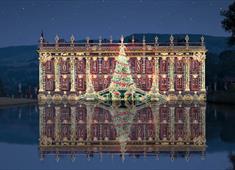 Chatsworth lit up with numbered windows of Advent